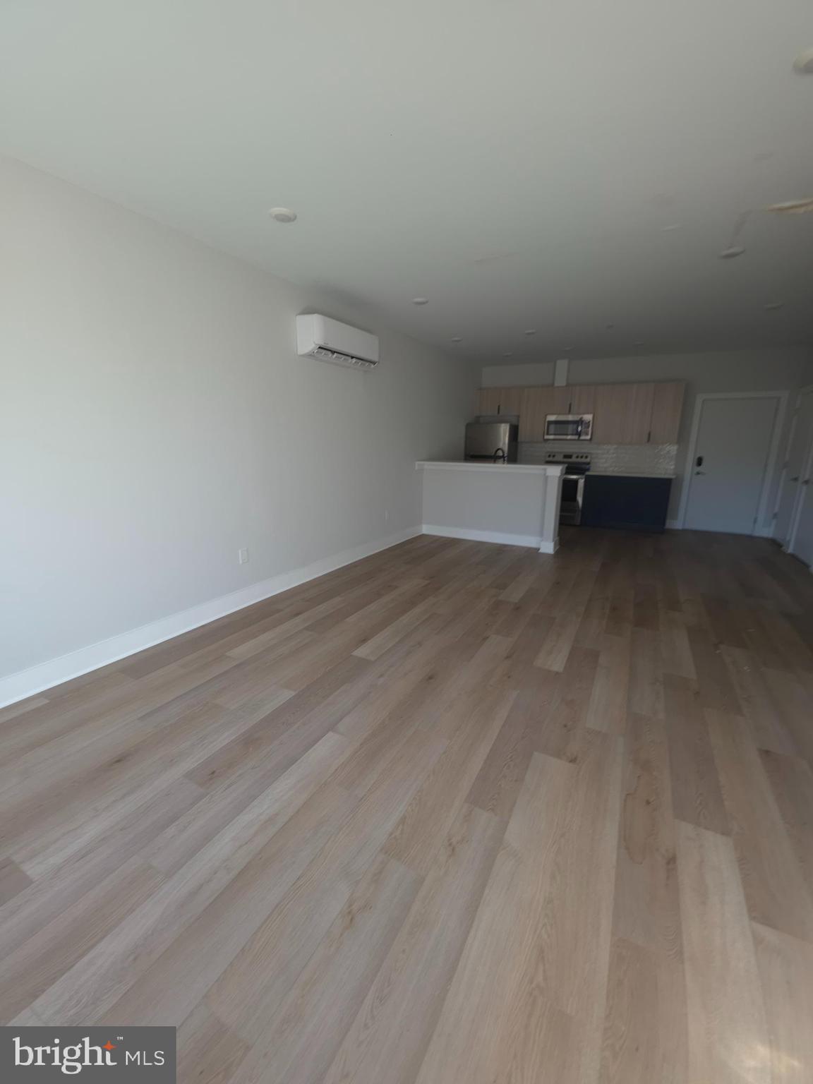 3503 Midvale Avenue, Unit 506 Philadelphia, PA 19129 - Photo 30 of 40 a view of a livingroom with an empty space