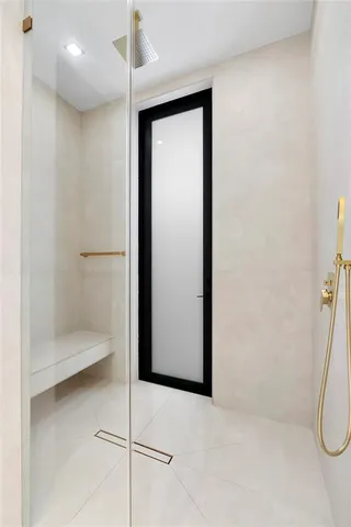 a bathroom with a toilet sink vanity and mirror