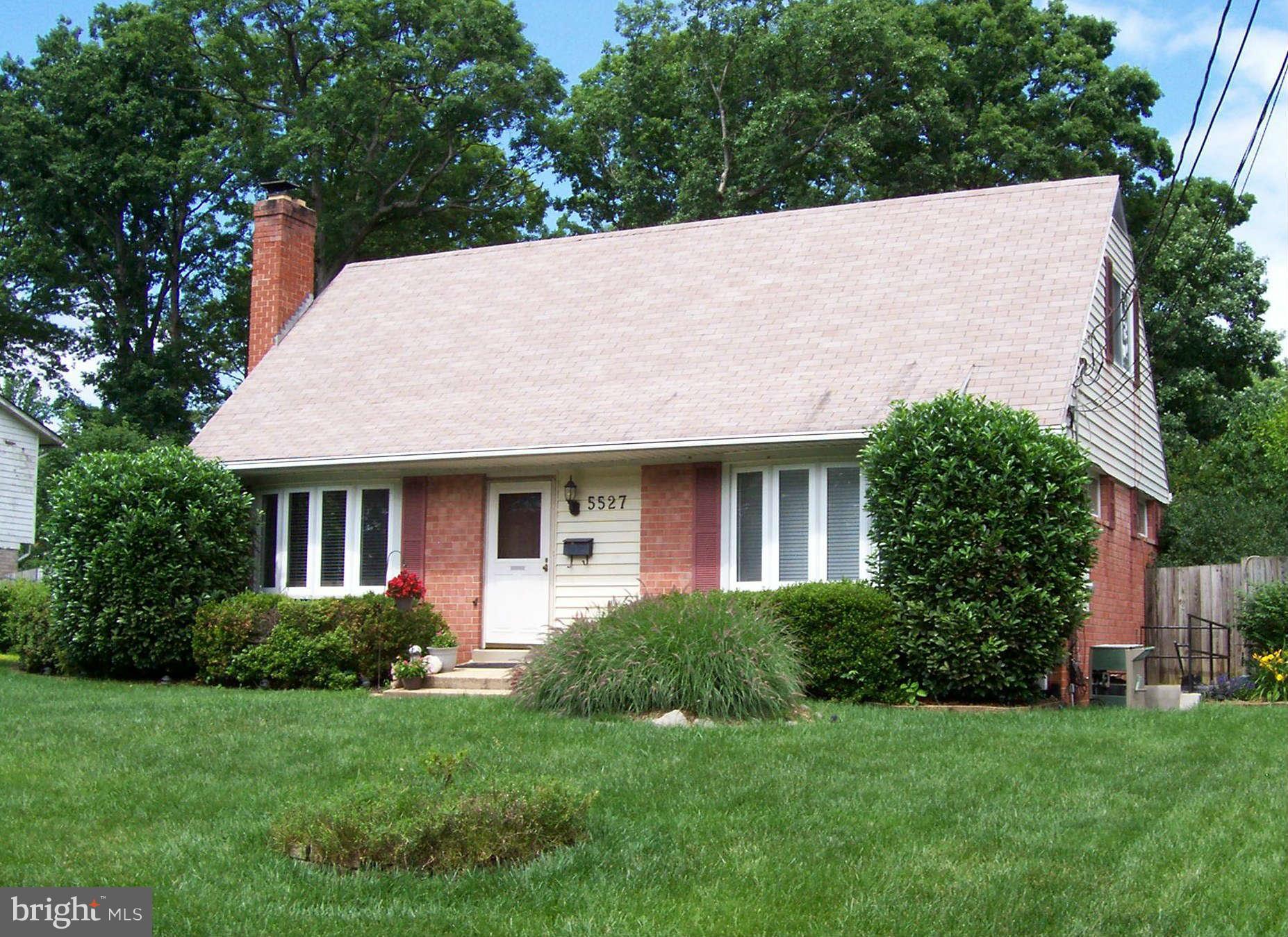 5527 Rolling Road Springfield, VA 22151 - Photo 5 of 27 a view of a house with a yard