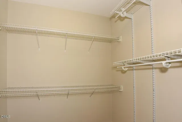 a view of a room with racks on the wall