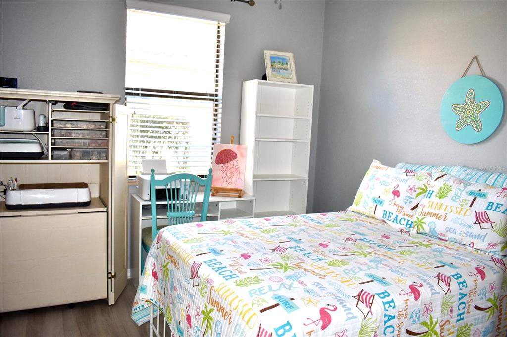 12675 Richezza Drive Venice, FL 34293 - Photo 20 of 60 a bedroom with a bed and a window