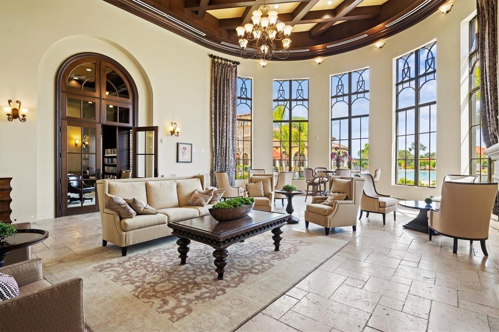 12675 Richezza Drive Venice, FL 34293 - Photo 49 of 60 a living room with furniture and a large window