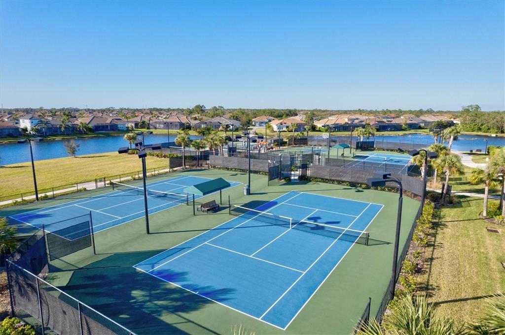 12675 Richezza Drive Venice, FL 34293 - Photo 56 of 60 a view of a tennis court