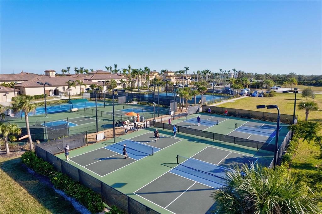 12675 Richezza Drive Venice, FL 34293 - Photo 57 of 60 a view of a chairs and table on the terrace