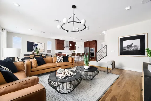 a living room with furniture or couch and a flat screen tv