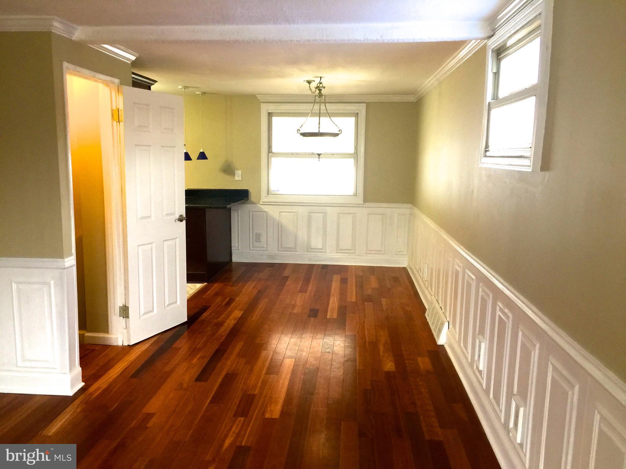 7406 Edsworth Road Baltimore, MD 21222 - Photo 4 of 24 Living Room/Dining Room