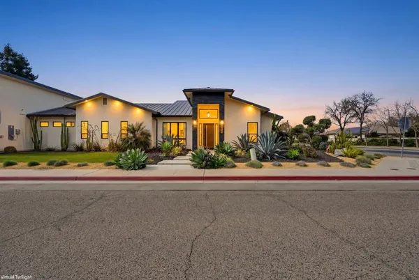 front view of a house with a street
