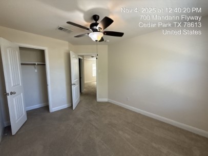 700 Mandarin Flyway, Unit 502 Cedar Park, TX 78613 - Photo 18 of 25 a view of empty room with wooden floor