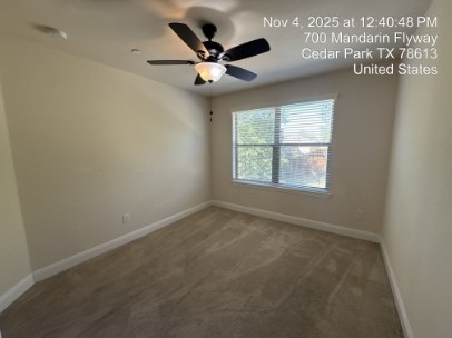 700 Mandarin Flyway, Unit 502 Cedar Park, TX 78613 - Photo 19 of 25 an empty room with ceiling fan and windows