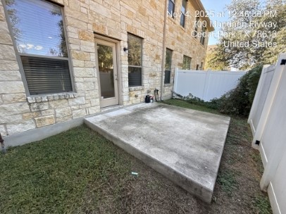 700 Mandarin Flyway, Unit 502 Cedar Park, TX 78613 - Photo 20 of 25 a view of a house with a yard
