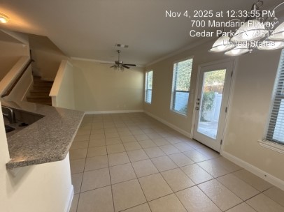 700 Mandarin Flyway, Unit 502 Cedar Park, TX 78613 - Photo 8 of 25 a view of a livingroom with a chandelier