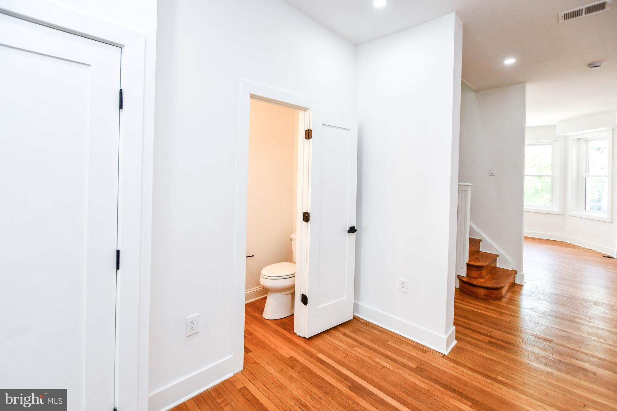 104 R Street Northeast, Unit A Washington, DC 20002 - Photo 11 of 43 a bathroom with a sink and a toilet
