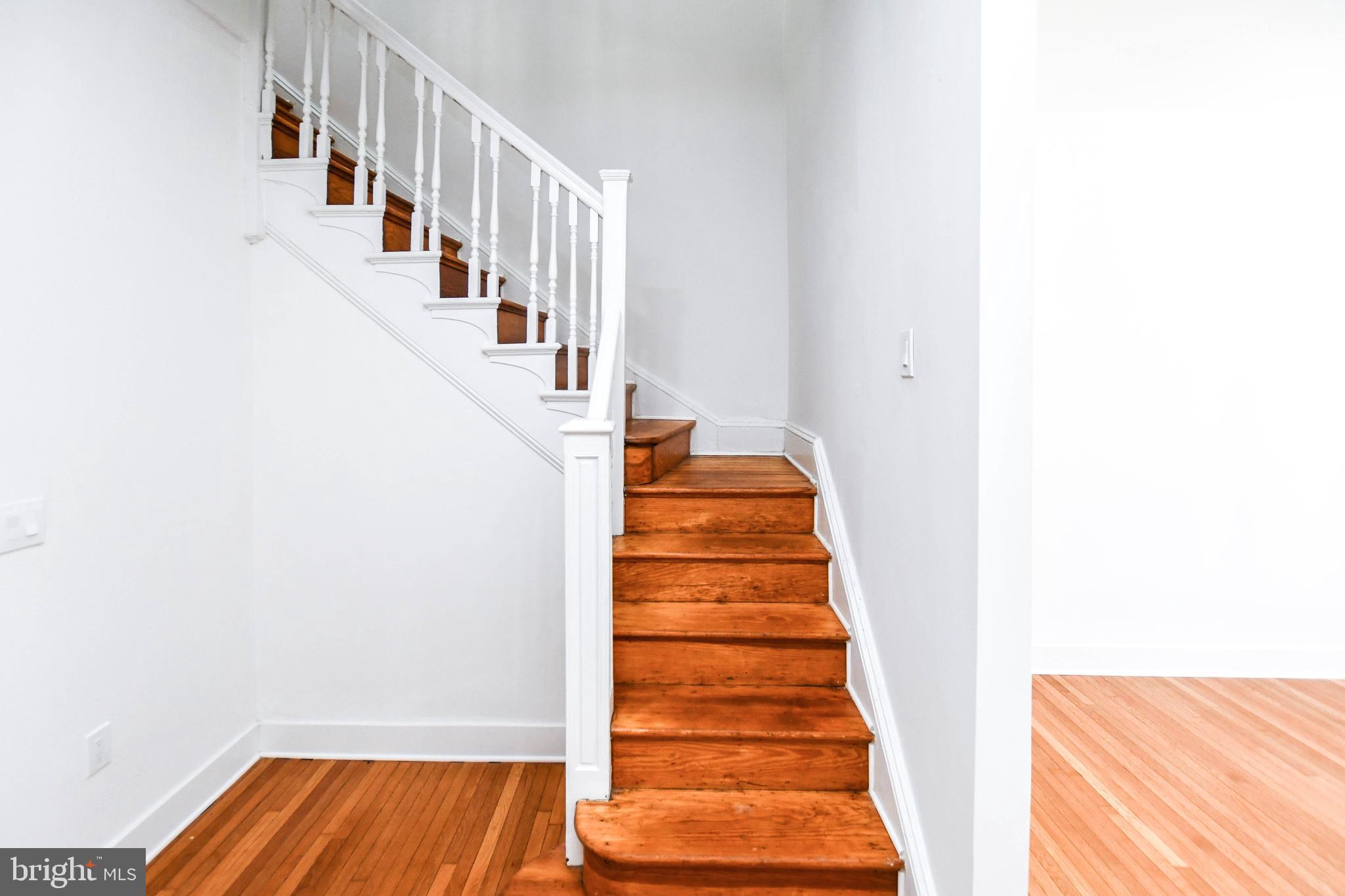 104 R Street Northeast, Unit A Washington, DC 20002 - Photo 20 of 43 a view of entryway and hall with wooden floor