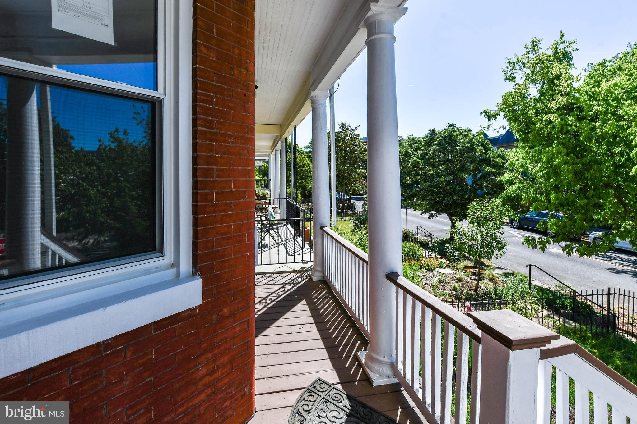104 R Street Northeast, Unit A Washington, DC 20002 - Photo 39 of 43 a view of balcony with wooden floor