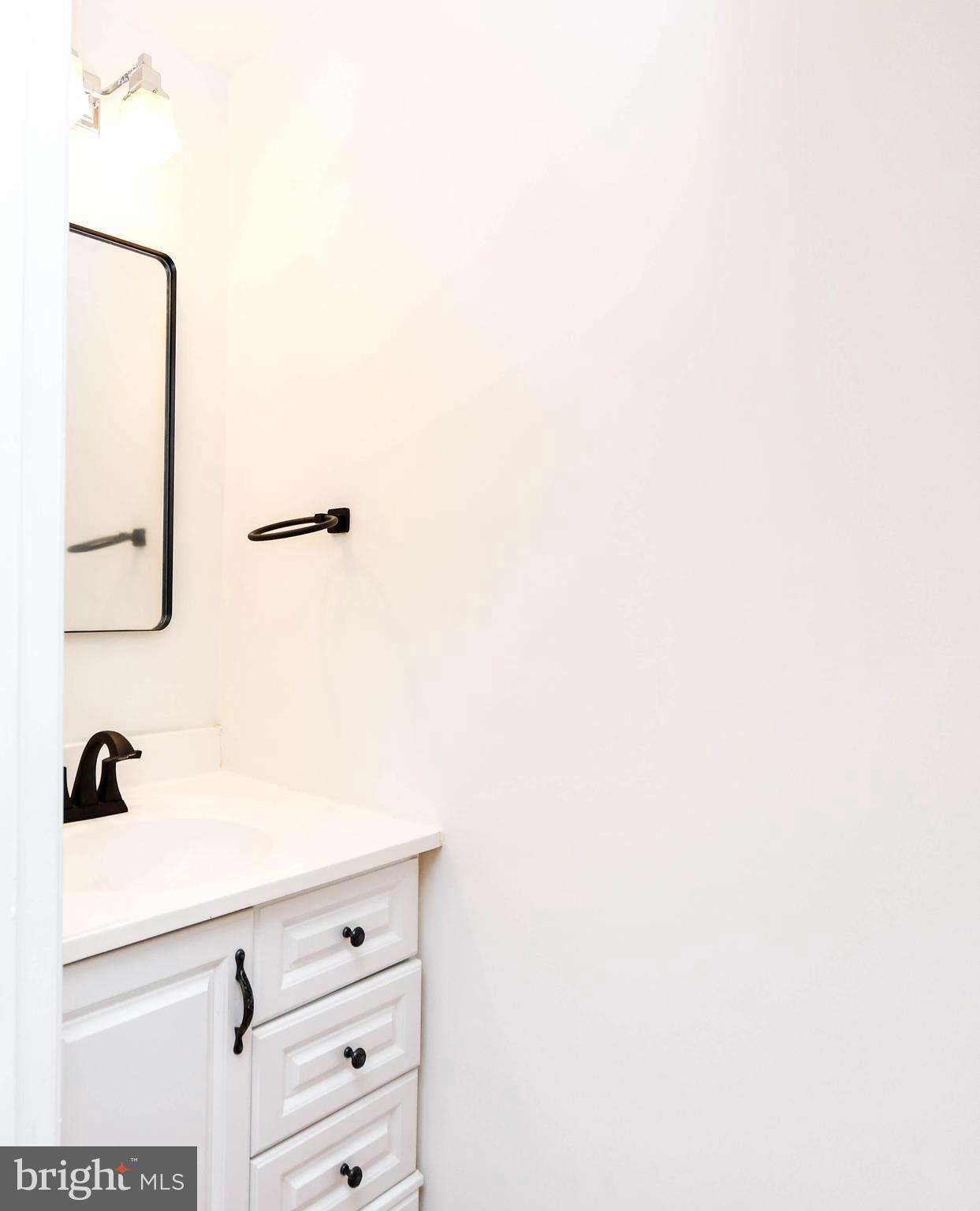 104 R Street Northeast, Unit A Washington, DC 20002 - Photo 10 of 43 a bathroom with a shower