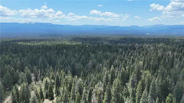 a view of a city and mountains