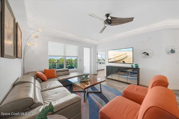 a workspace with furniture and wooden floor