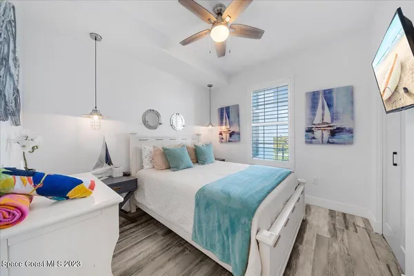 a bathroom with a toilet a sink and a mirror