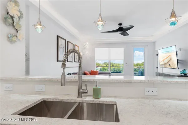 a kitchen with a sink and a window