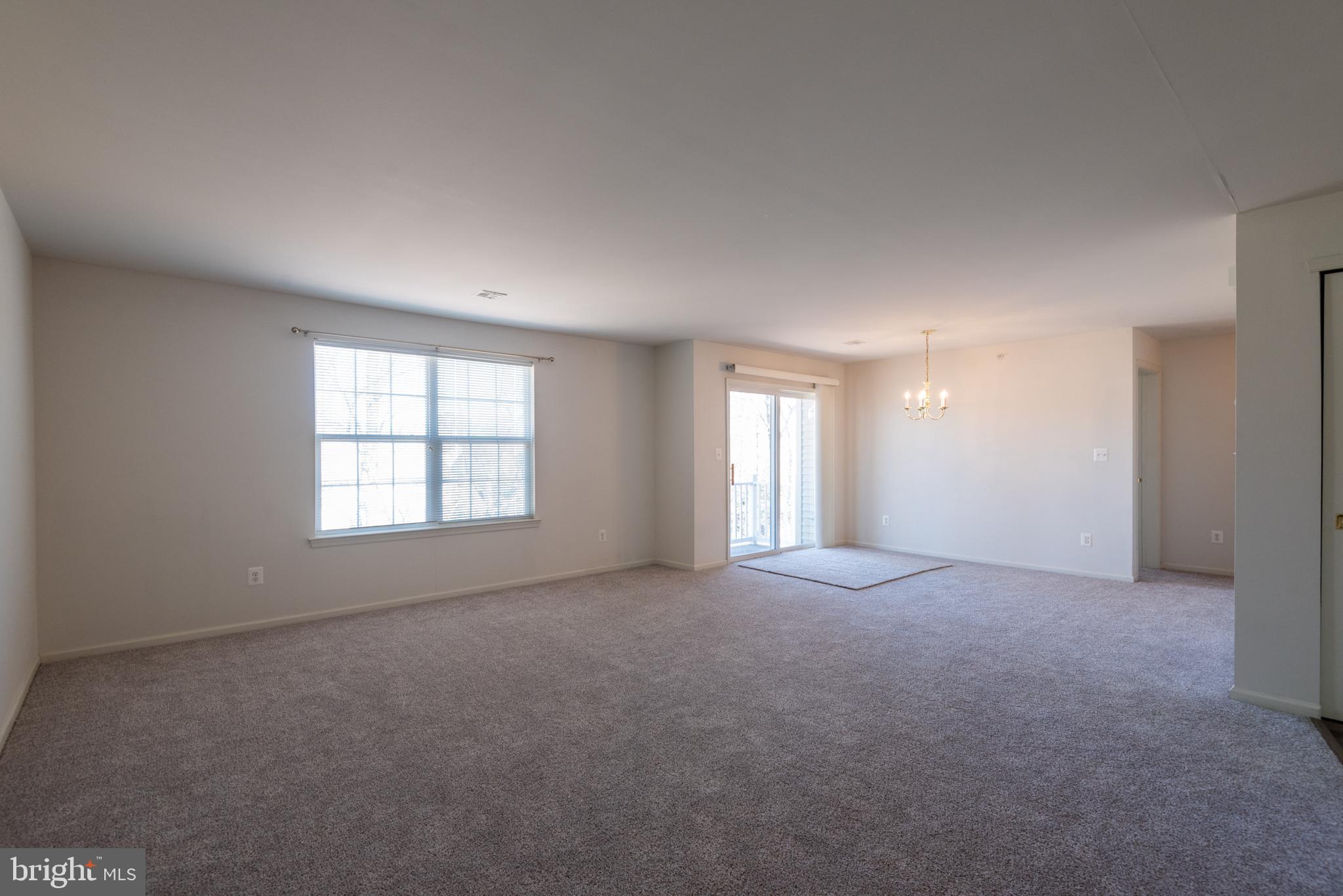 938 Pine Valley Court Tuckerton, NJ 08087 - Photo 3 of 20 Unstaged living room/dining