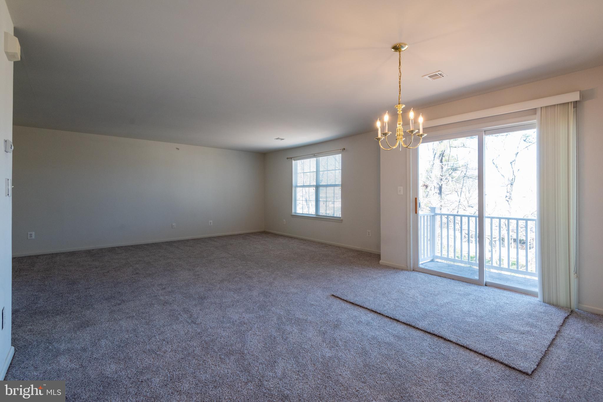 938 Pine Valley Court Tuckerton, NJ 08087 - Photo 5 of 20 Unstaged dining/living room