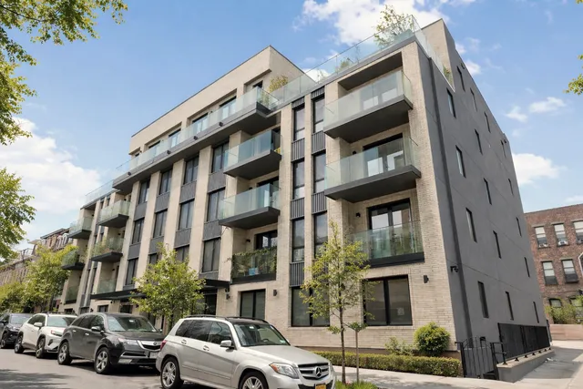 a bedroom with a bed and a view of bathroom