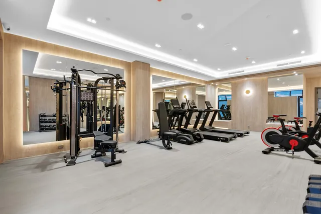 a spacious bathroom with a bathtub and a shower