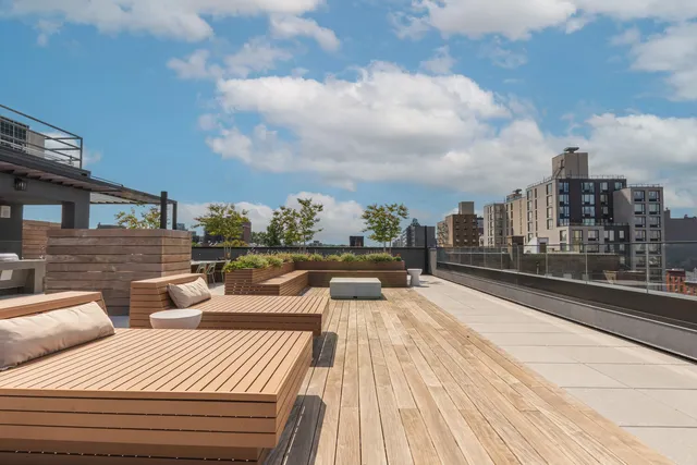 a view of a terrace with seating area
