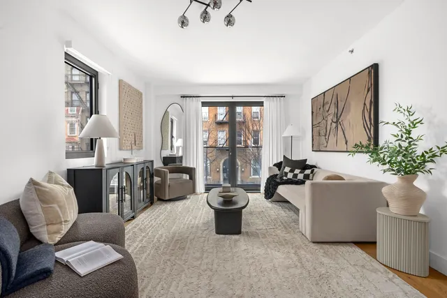 a view of a workspace with furniture