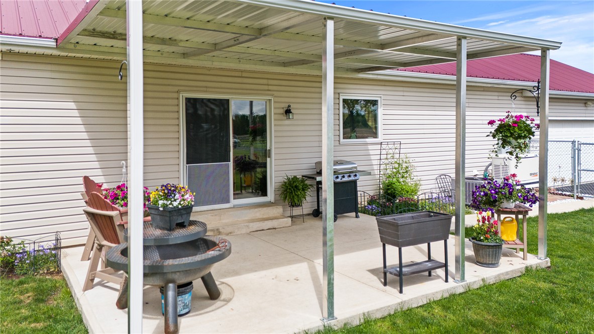 4222 Ramsey Road Springfield, OH 45502 - Photo 16 of 79 This inviting patio offers a serene outdoor retreat perfect for relaxation.