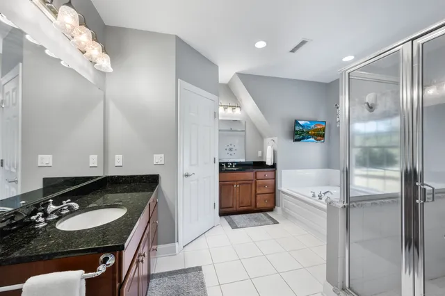 a kitchen with a refrigerator and a stove