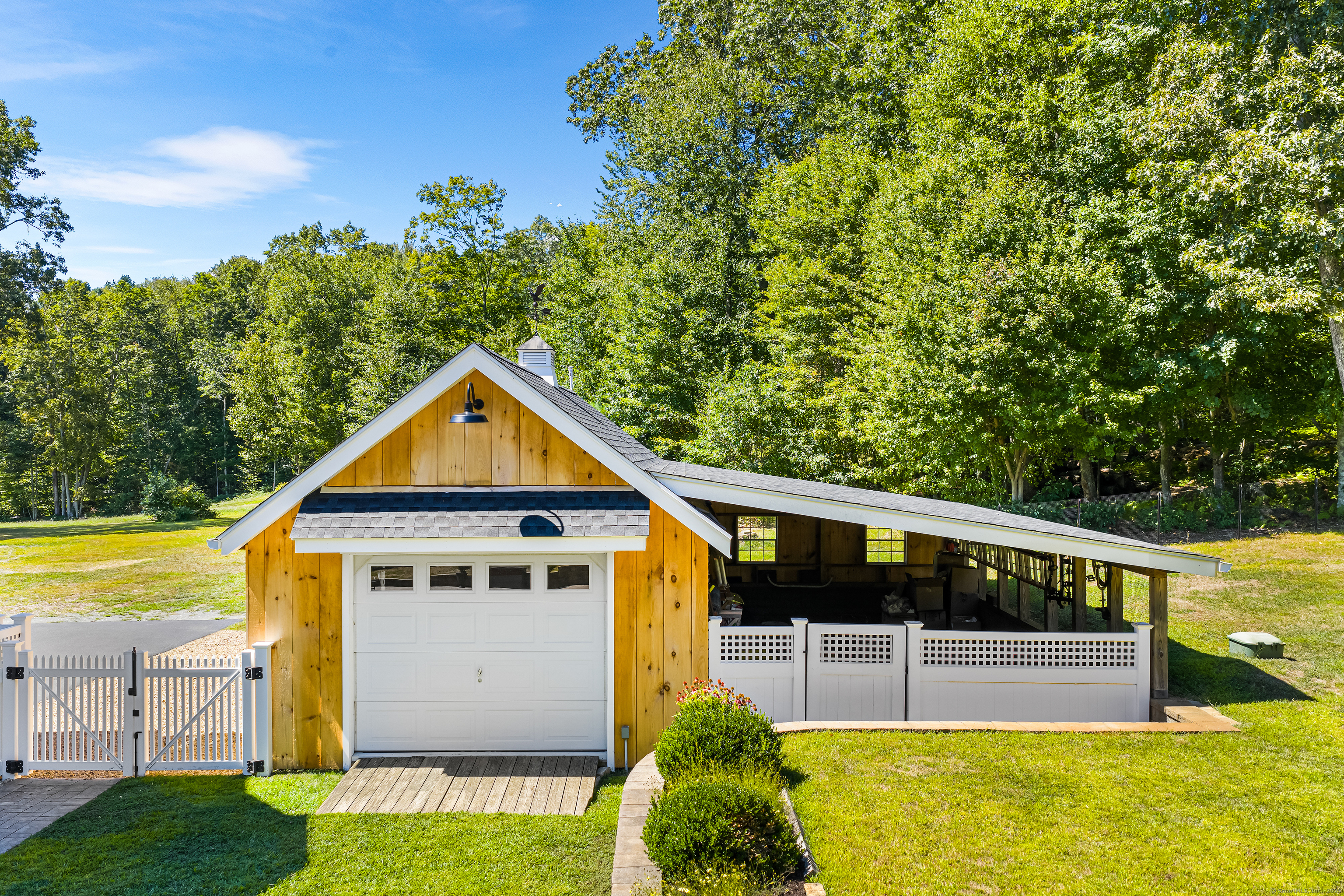 23 Olmstead Road East Haddam, CT 06423 - Photo 33 of 38 a view of a house with a swimming pool