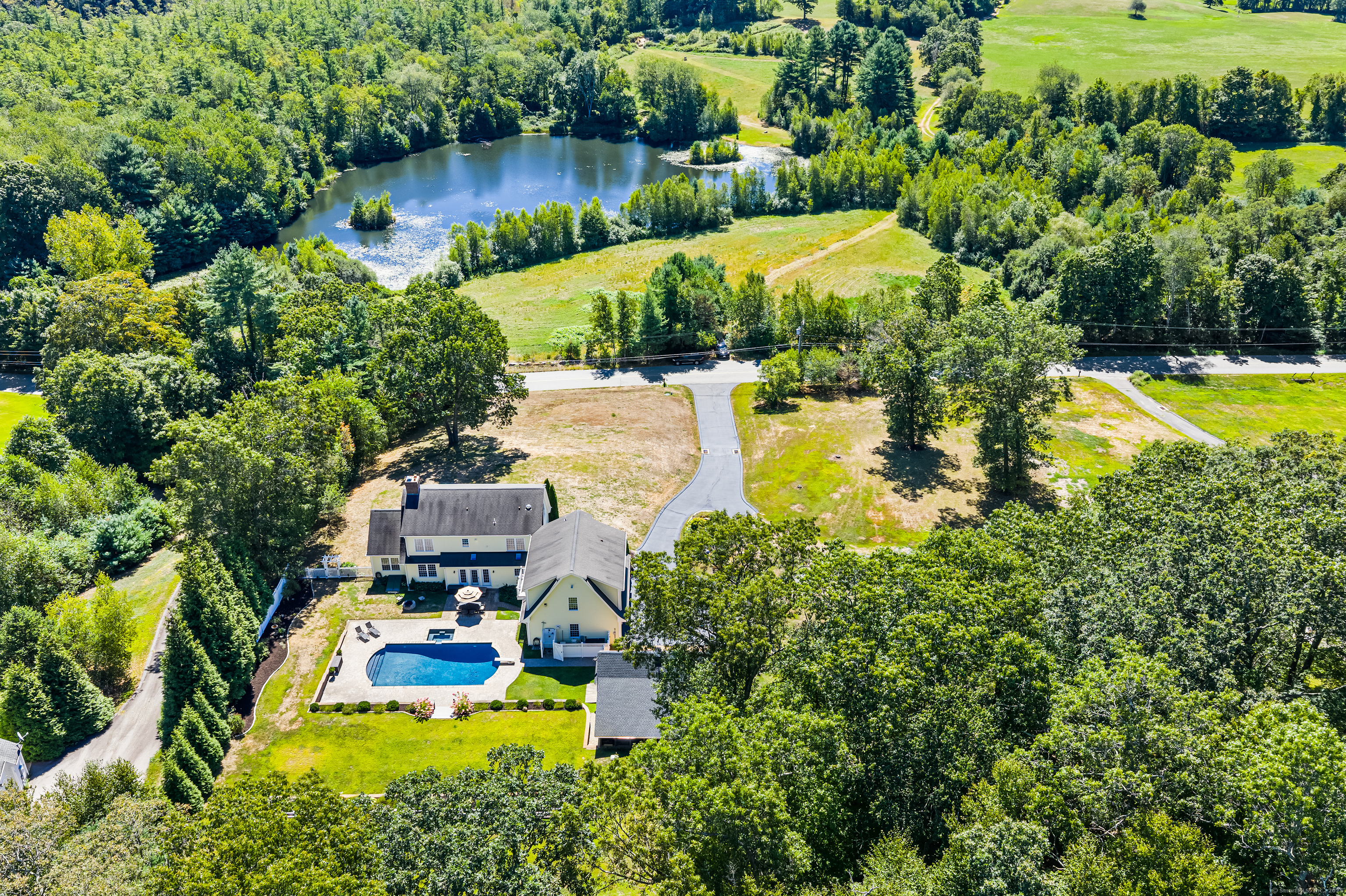 23 Olmstead Road East Haddam, CT 06423 - Photo 37 of 38 an aerial view of a house with swimming pool outdoor seating and yard