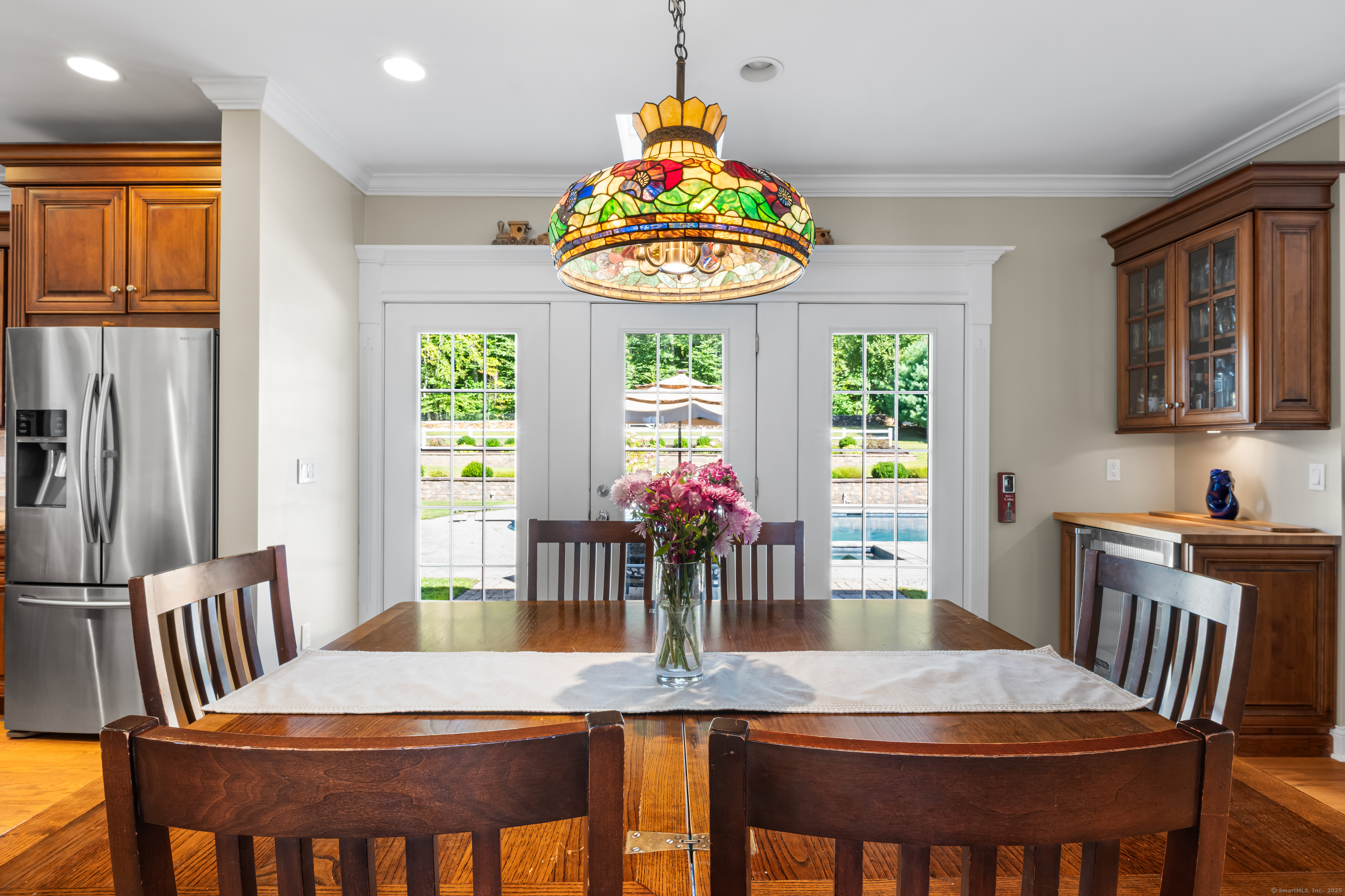 23 Olmstead Road East Haddam, CT 06423 - Photo 7 of 38 a view of a dining room with furniture window and wooden floor