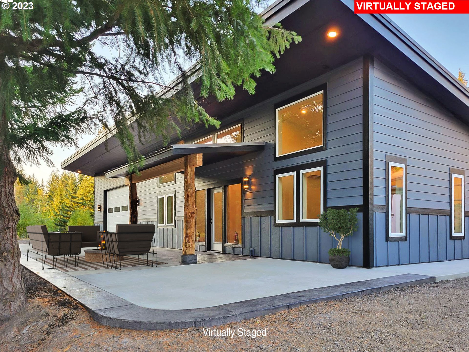 5 Cloud Line Road White Salmon, WA 98672 - Photo 6 of 40 a view of the house with a tree and sitting area