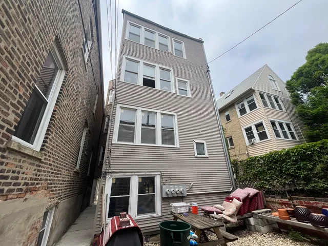 a brick building with a large windows
