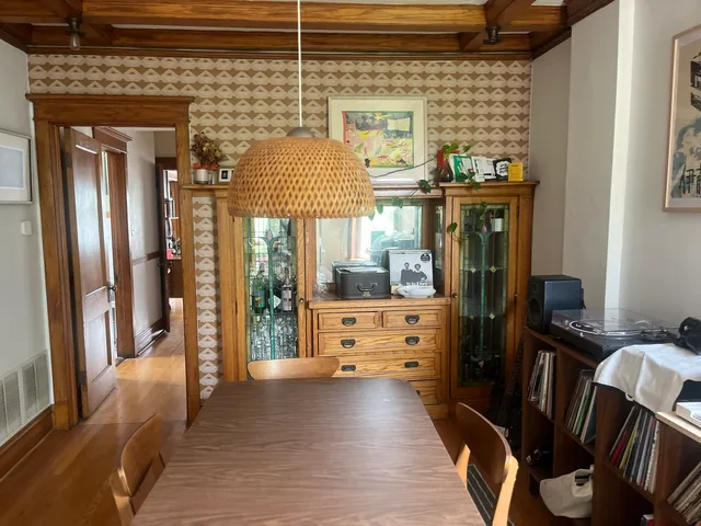 a kitchen with a refrigerator and a stove