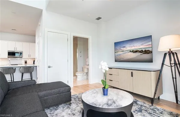 a kitchen with a dining table and chairs