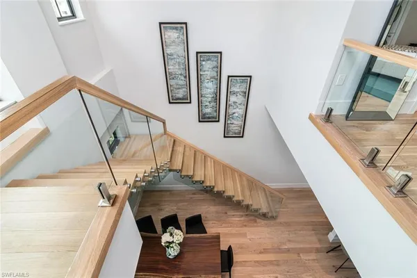 a view of balcony with furniture