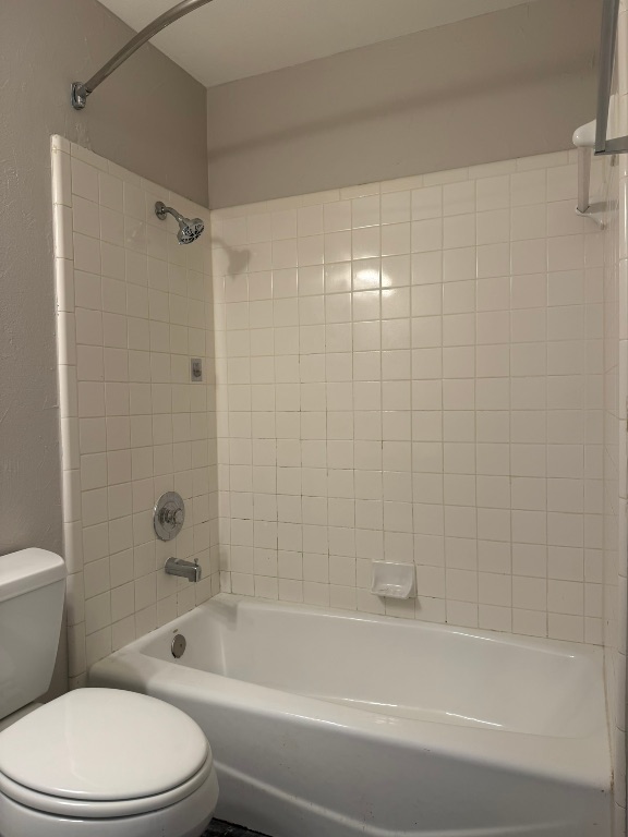 1904 Alex Avenue, Unit A Austin, TX 78728 - Photo 10 of 15 Full bathroom featuring tub / shower combination and toilet
