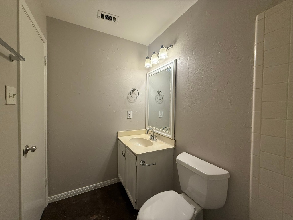 1904 Alex Avenue, Unit A Austin, TX 78728 - Photo 11 of 15 Bathroom with a textured wall and vanity