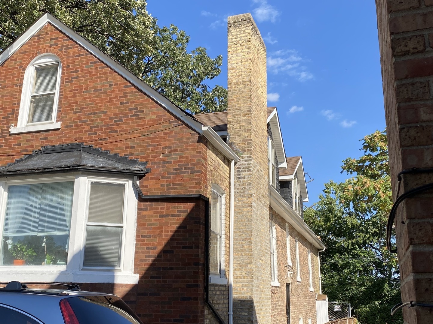 Undisclosed Address Chicago, IL 60639 - Photo 2 of 20 a view of a house with a yard