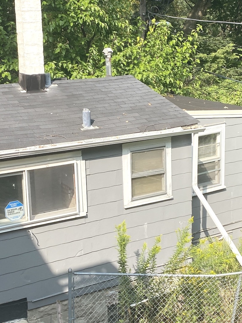 Undisclosed Address Chicago, IL 60639 - Photo 20 of 20 a room with storage and utility