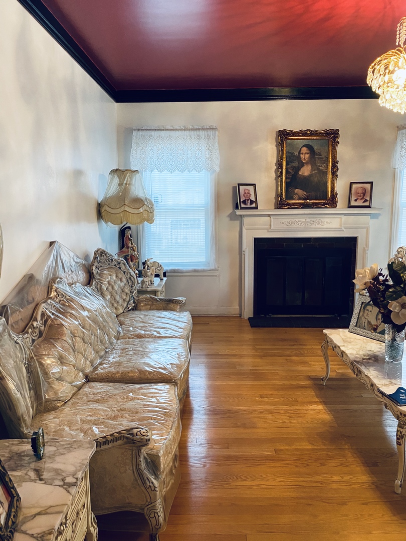 Undisclosed Address Chicago, IL 60639 - Photo 6 of 20 a room with a bed and a dresser