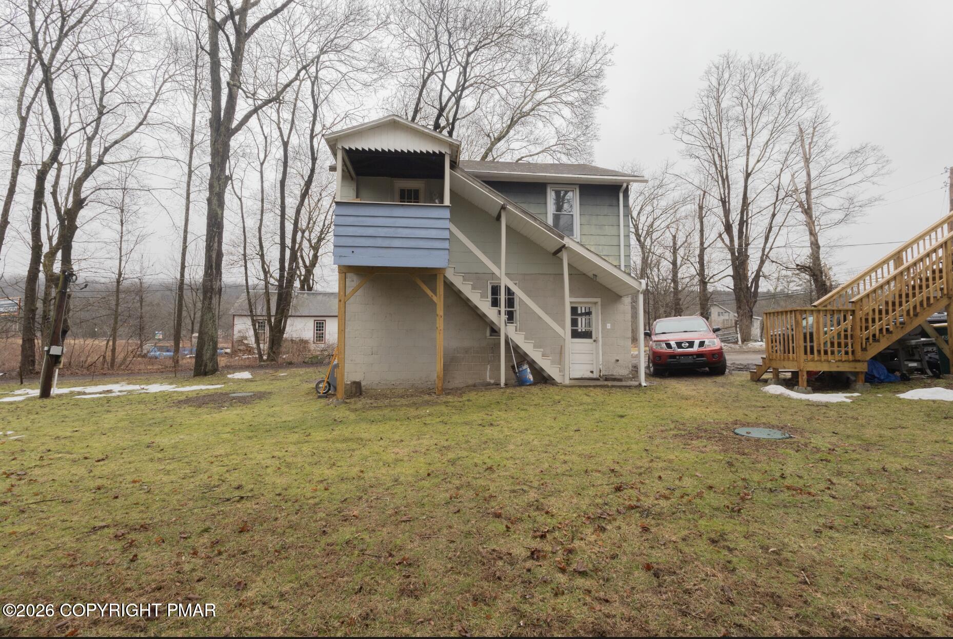 600 Rte 115 Saylorsburg, PA 18353 - Photo 19 of 26 a house with trees in front of it
