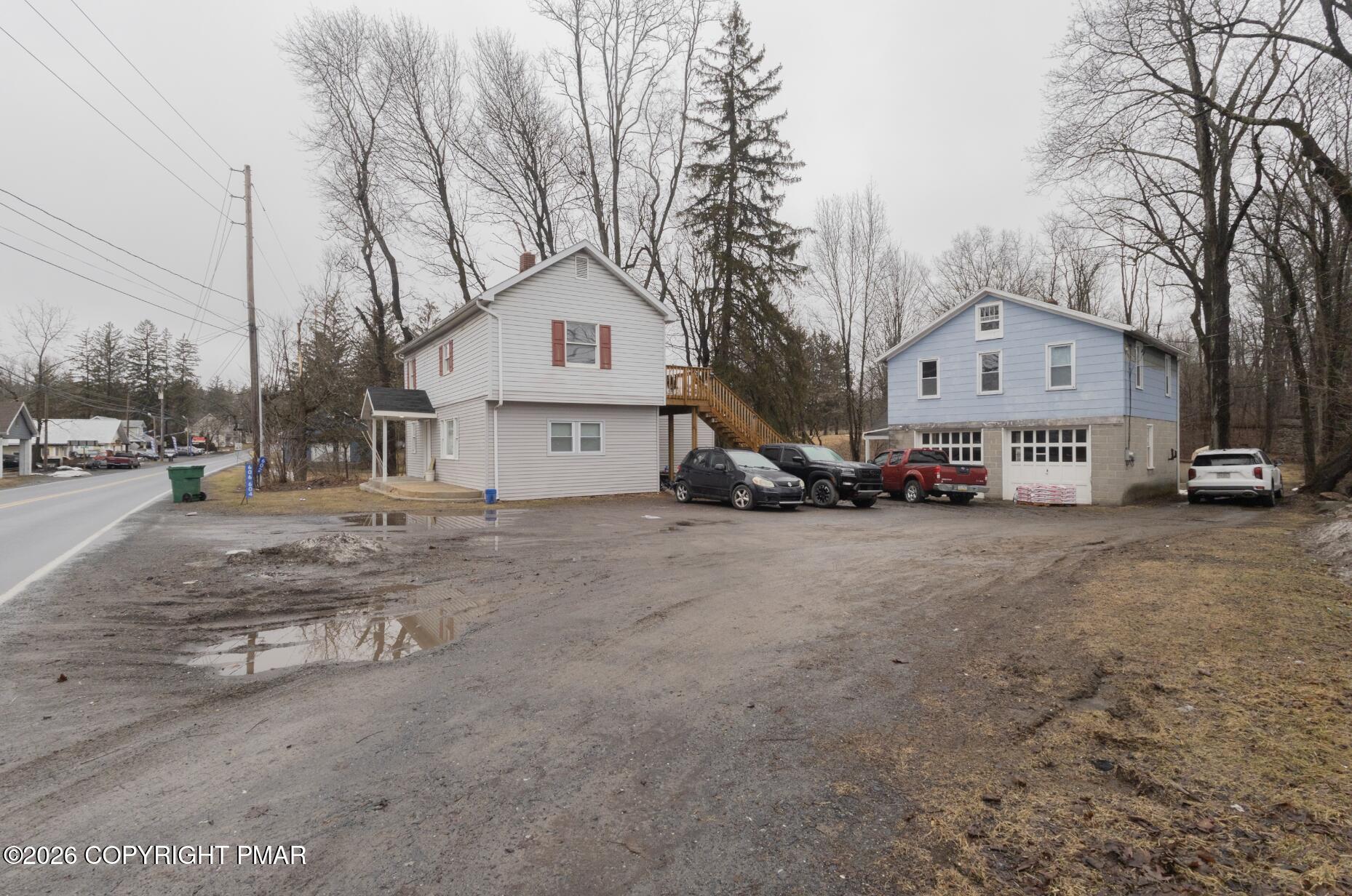 600 Rte 115 Saylorsburg, PA 18353 - Photo 2 of 26 a view of a large house with a large tree in front of it