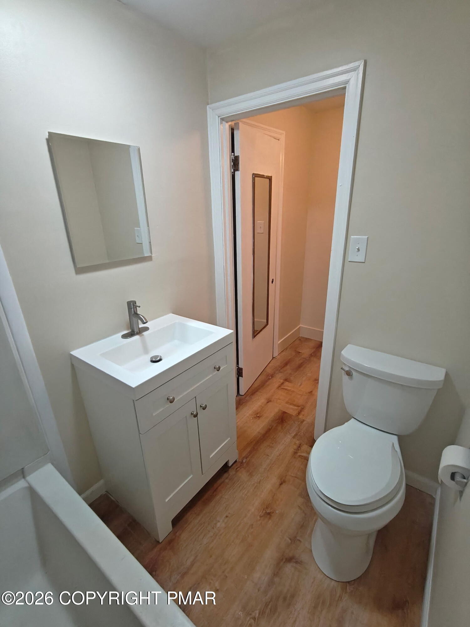 600 Rte 115 Saylorsburg, PA 18353 - Photo 21 of 26 a white toilet sitting next to a bathroom sink