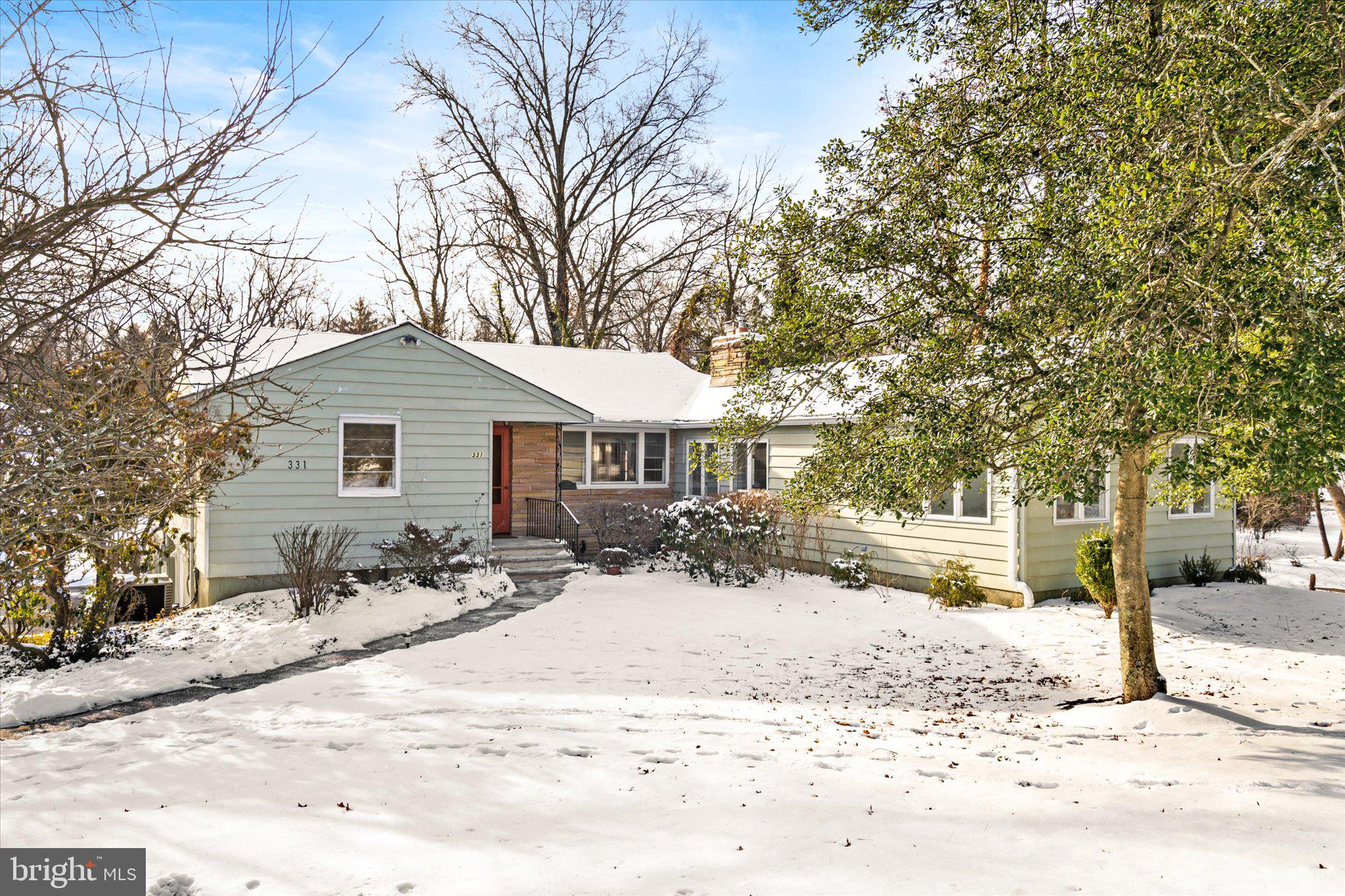 331 Hamilton Avenue Princeton, NJ 08540 - Photo 1 of 31 a view of a house with a yard covered in snow