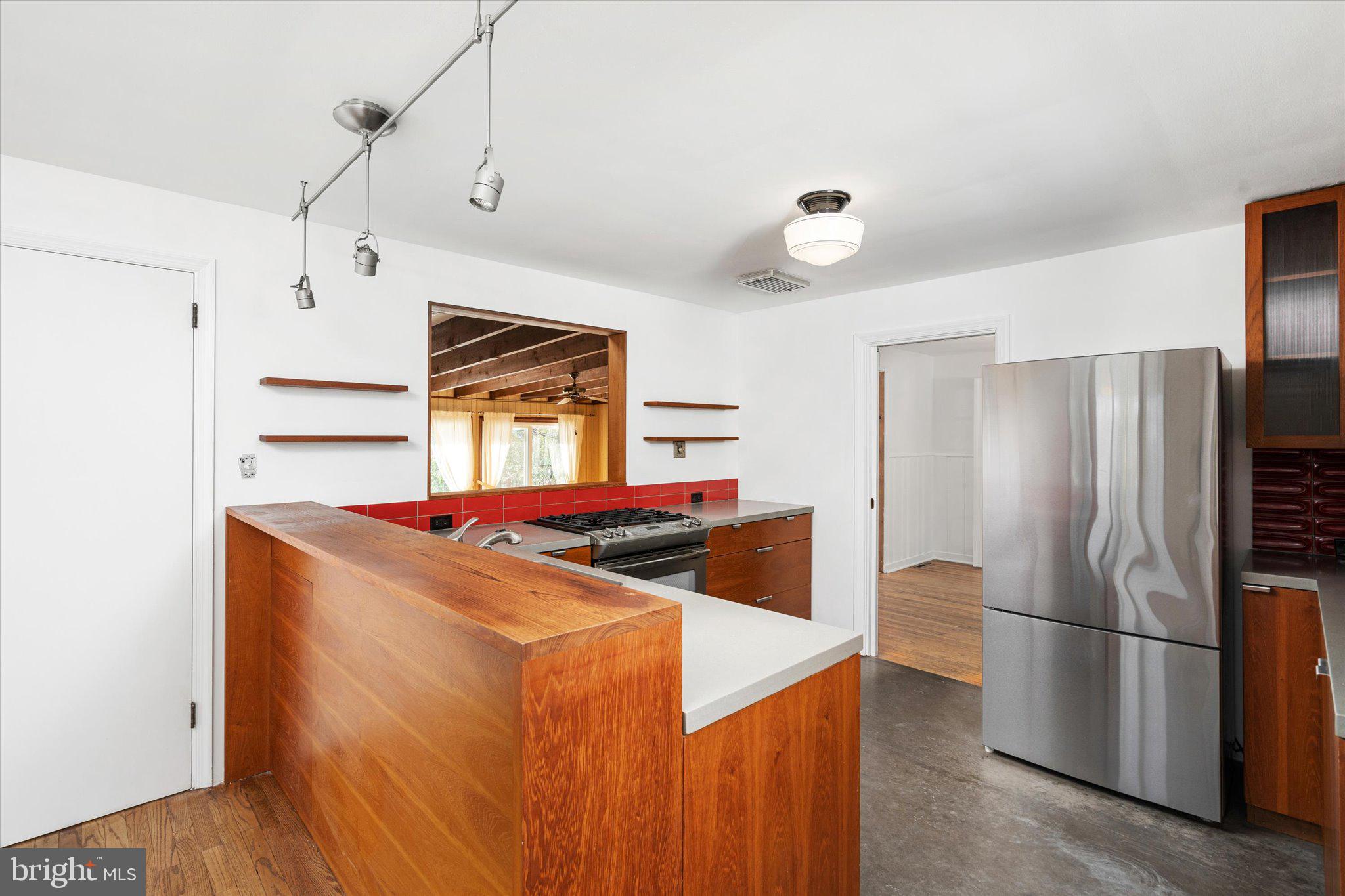 331 Hamilton Avenue Princeton, NJ 08540 - Photo 11 of 31 a kitchen with stainless steel appliances granite countertop a refrigerator a oven and a refrigerator