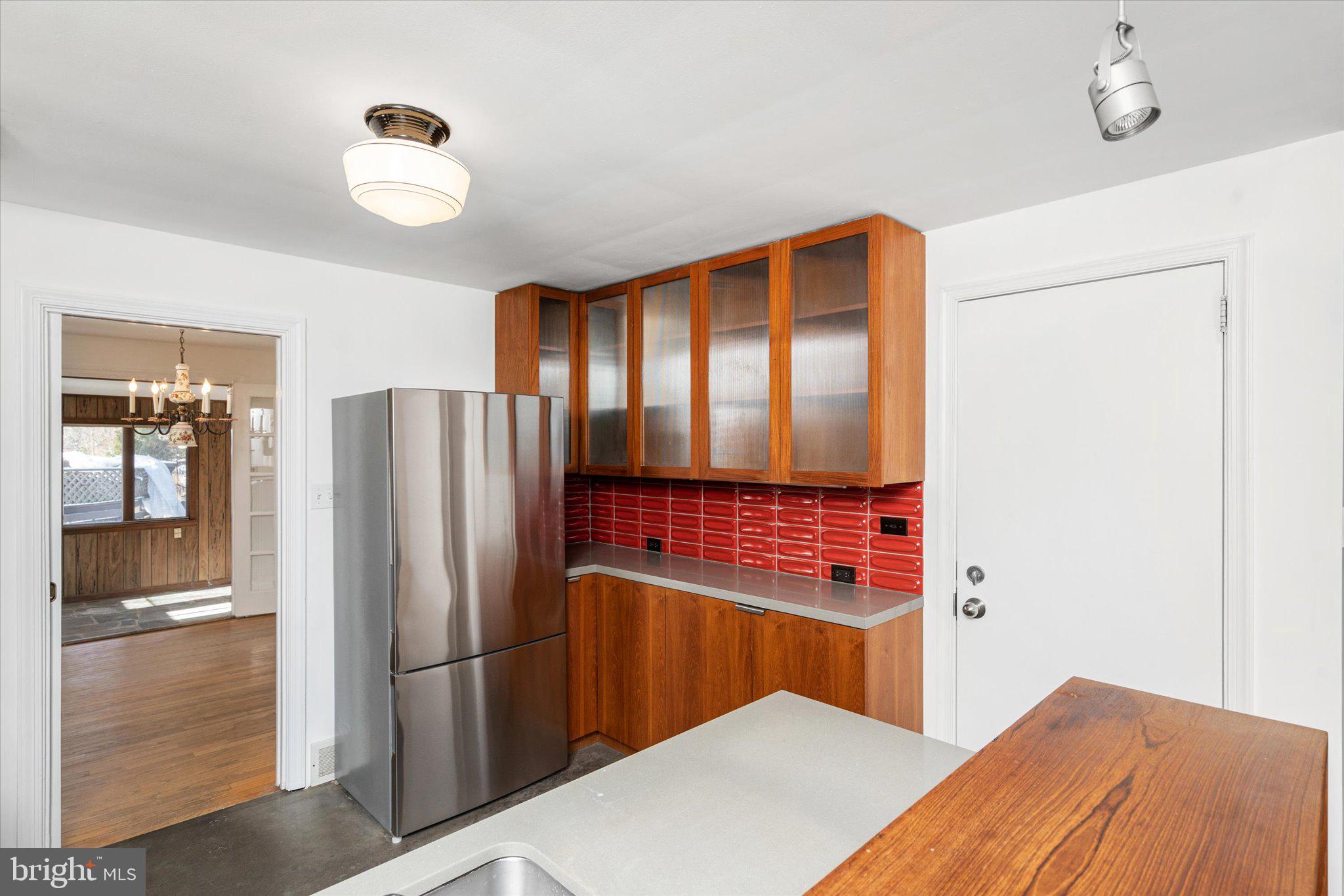 331 Hamilton Avenue Princeton, NJ 08540 - Photo 12 of 31 a kitchen with stainless steel appliances granite countertop a refrigerator and a sink